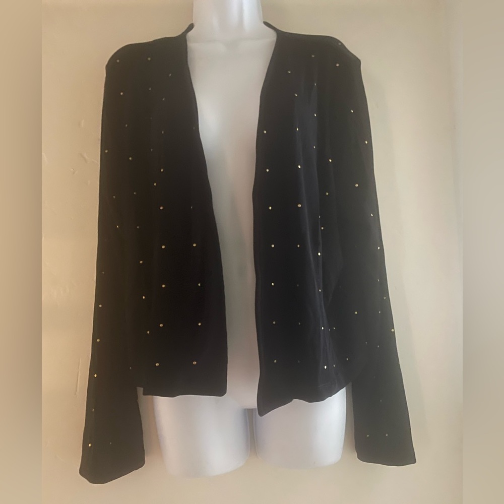 Great for the holidays  a Chico’s Travelers black knit jacket with brass studs.